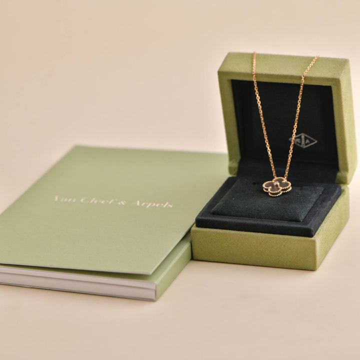 Van Cleef & Arpels Vintage Alhambra Silver Obsidian Diamond 2023 Holiday Pendant