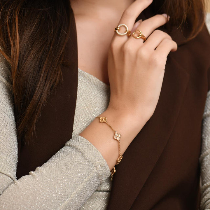 Second Hand Van Cleef & Arpels Sweet Alhambra 6 Motif 18K Hammered Rose Gold Bracelet