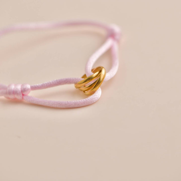 Cartier Trinity 18K Yellow Gold Pink Silk Cord Bracelet