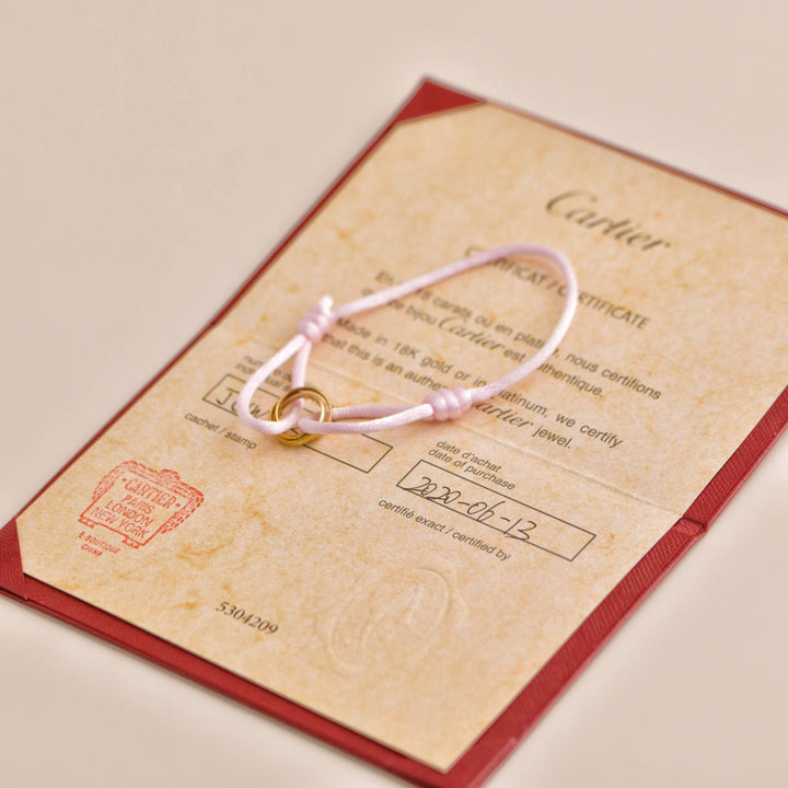 Cartier Trinity 18K Yellow Gold Pink Silk Cord Bracelet