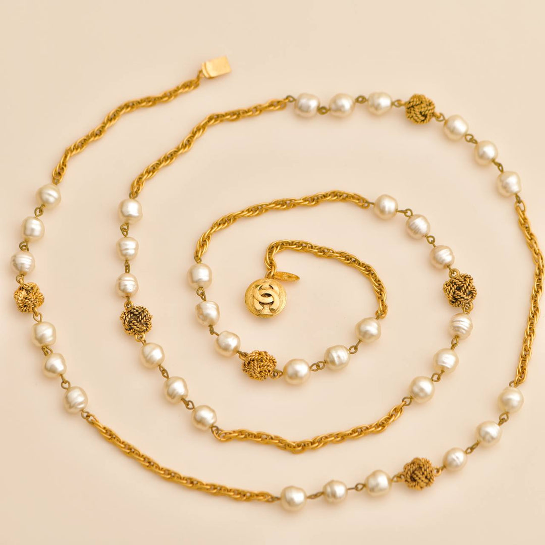 Used Chanel CC Faux Pearl Gold Tone Rope Bead Long Necklace