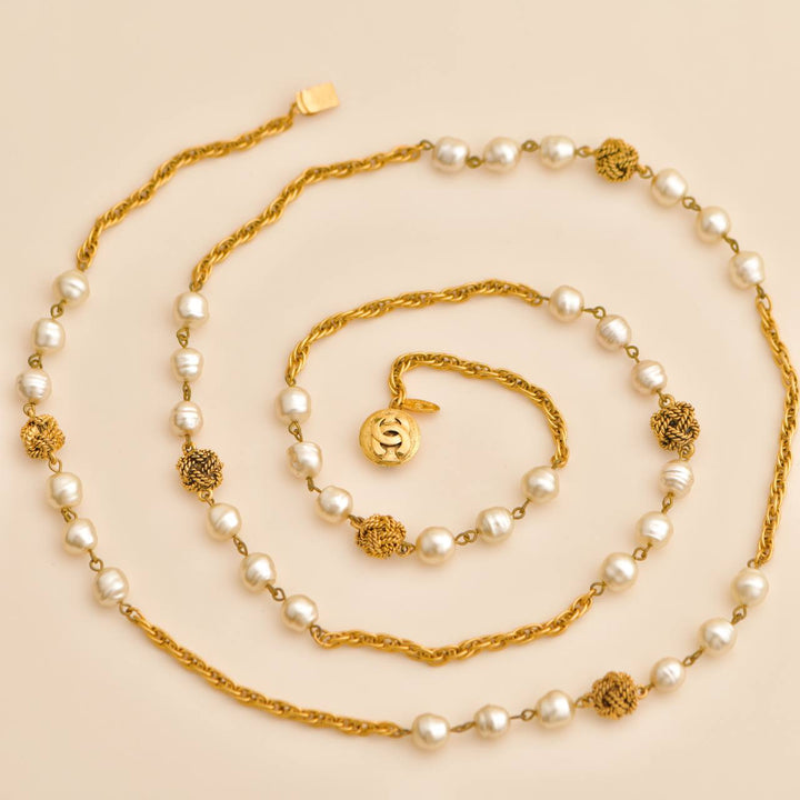 Used Chanel CC Faux Pearl Gold Tone Rope Bead Long Necklace