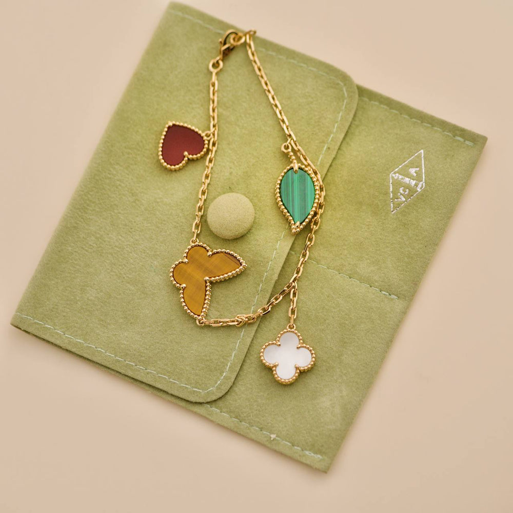 Preowned Van Cleef & Arpels Lucky Alhambra 4 Motifs 18K Yellow Gold Bracelet