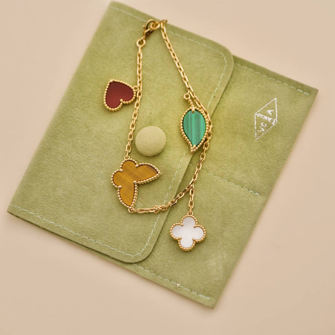 Preowned Van Cleef & Arpels Lucky Alhambra 4 Motifs 18K Yellow Gold Bracelet