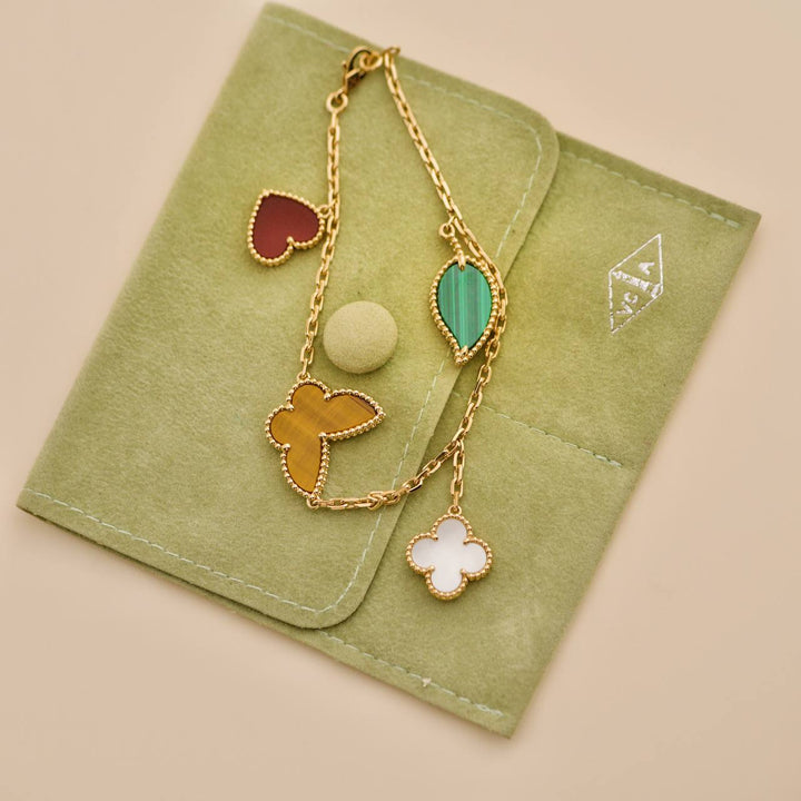 Preowned Van Cleef & Arpels Lucky Alhambra 4 Motifs 18K Yellow Gold Bracelet