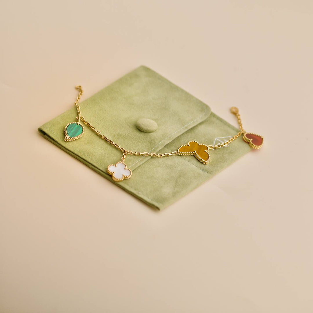 Preowned Van Cleef Lucky Alhambra 4 Motifs 18K Yellow Gold Bracelet