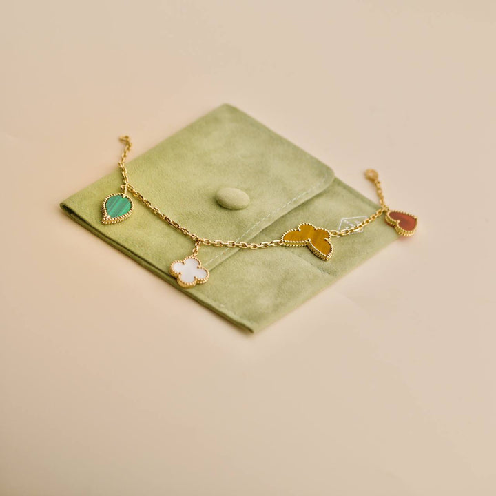 Preowned Van Cleef Lucky Alhambra 4 Motifs 18K Yellow Gold Bracelet