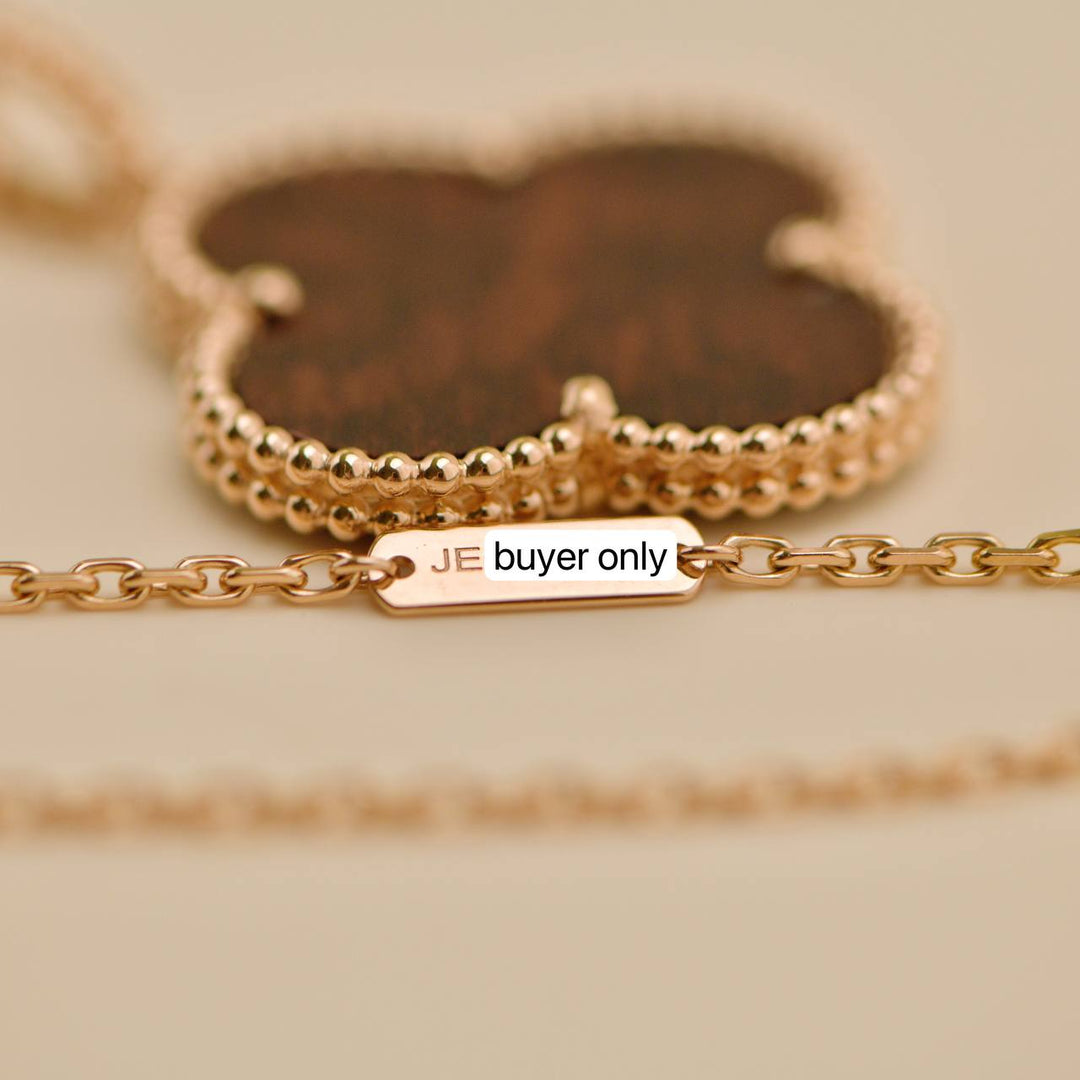 Preowned Van Cleef Magic Alhambra Letterwood 18k Gold Pendant Necklace