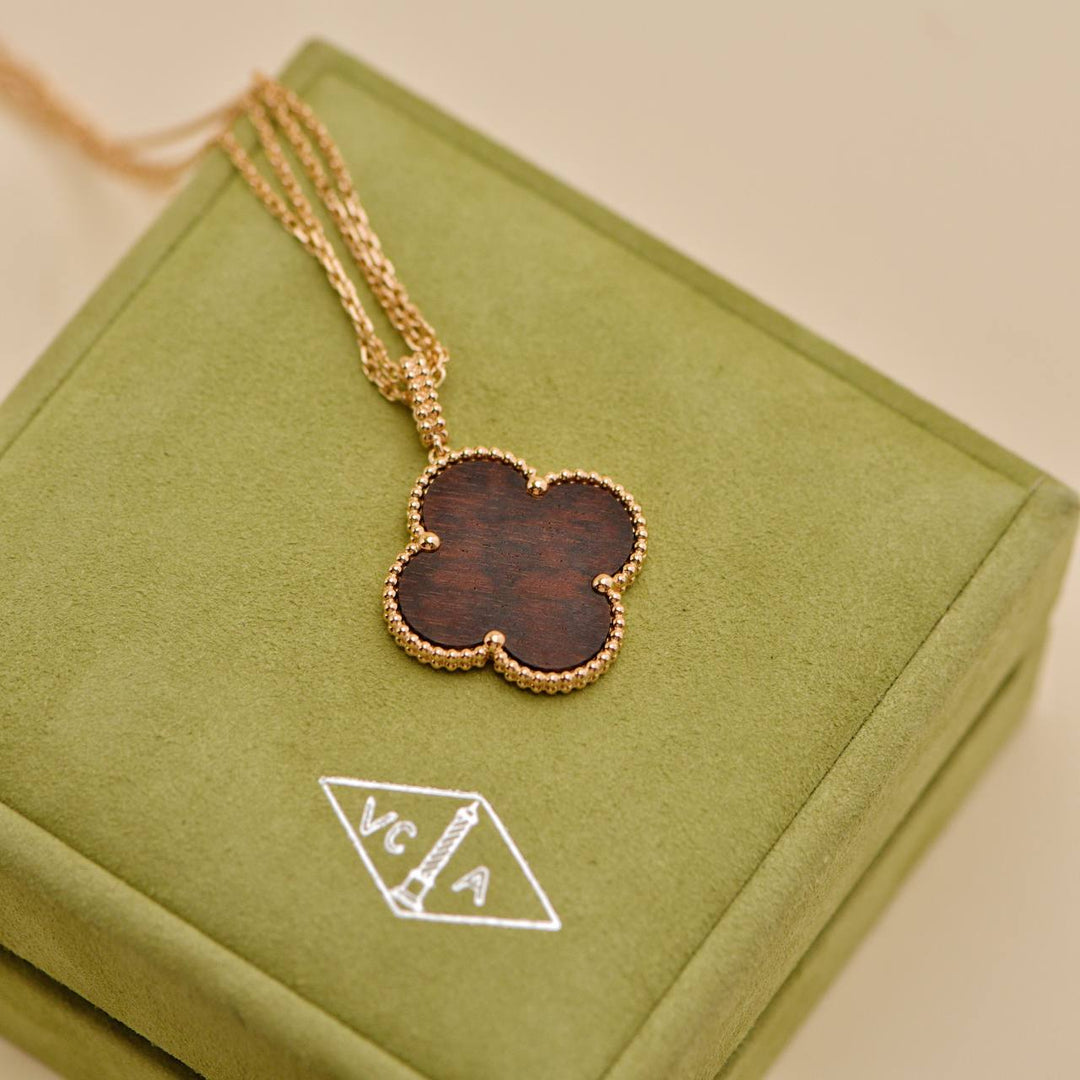 Second Hand Van Cleef & Arpels Magic Alhambra Letterwood 18k Rose Gold Pendant Necklace