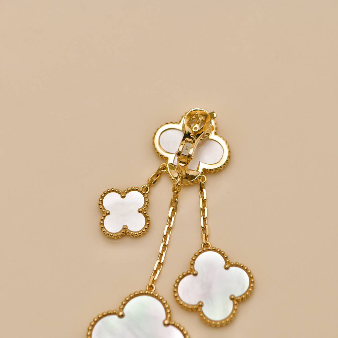 Preowned Van Cleef Magic Alhambra 4 motif Mother of Pearl 18K Yellow Gold Earrings