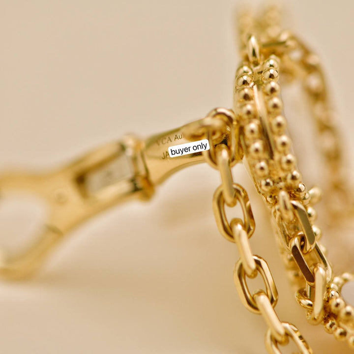 Second Hand Van Cleef Magic Alhambra 4 motif Mother of Pearl 18K Yellow Gold Earrings