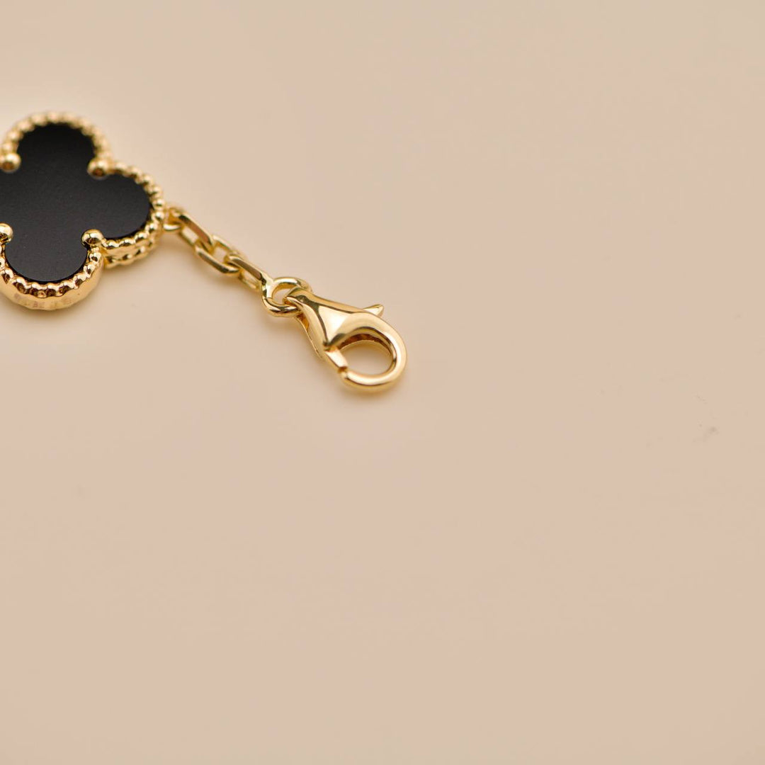 Second Hand Van Cleef Vintage Alhambra 5 Motif Onyx 18K Yellow Gold Bracelet
