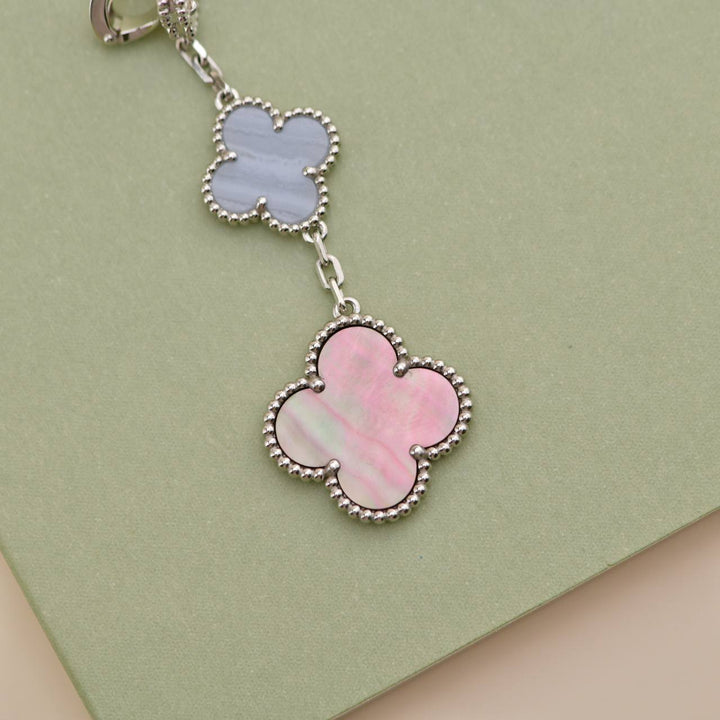 Second Hand Van Cleef Magic Mother of Pearl and Chalcedony 3 Motif Earrings