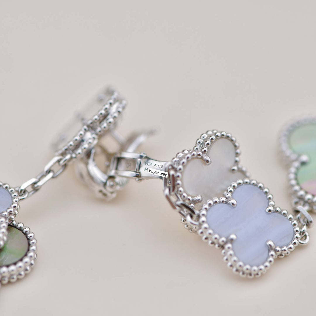 Preowned Van Cleef Magic Mother of Pearl and Chalcedony 3 Motif Earrings