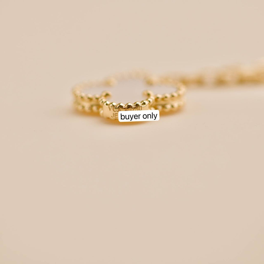 Second Hand Van Cleef Magic Alhambra 6 Motifs Mother of Pearl 18K Yellow Gold Necklace