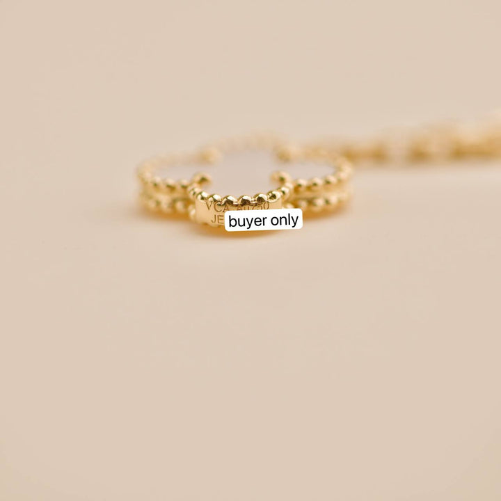 Second Hand Van Cleef Magic Alhambra 6 Motifs Mother of Pearl 18K Yellow Gold Necklace