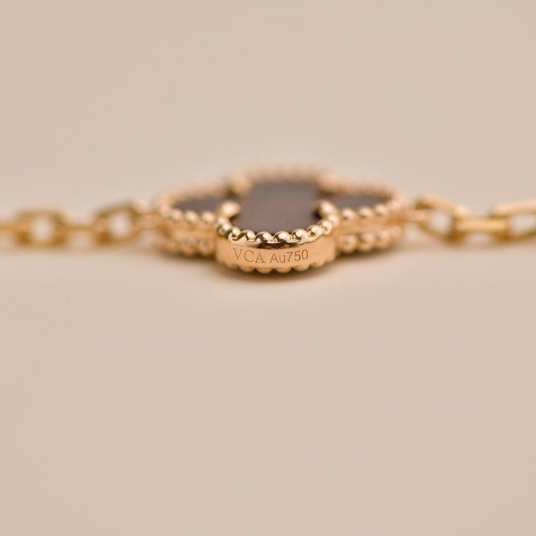 Second Hand Van Cleef Vintage Alhambra Letterwood 5 Motif 18K Yellow Rose Bracelet