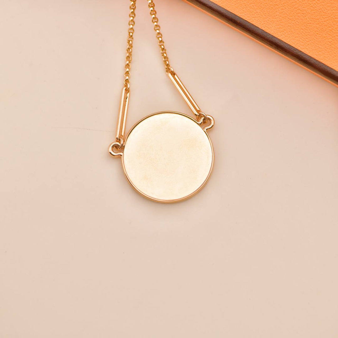 Second Hand Hermès 18K Gold Coin Pendant Necklace