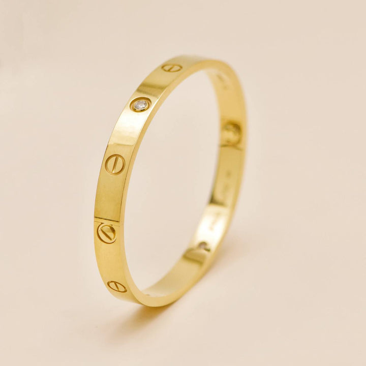 Preloved Cartier Love Four Diamond 18K Yellow Gold Bracelet