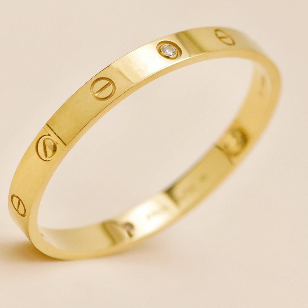 Preowned Cartier Love 4 Diamond 18K Yellow Gold Bracelet