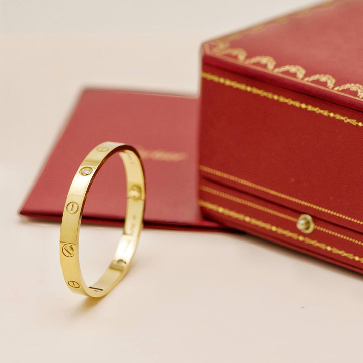 Preowned Cartier Love 4 Diamond 18K Yellow Gold Bracelet Size 17