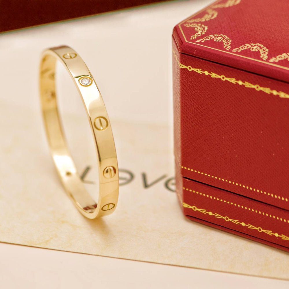 Preowned Cartier Love 4 Diamond 18K Yellow Gold Bracelet Size 18