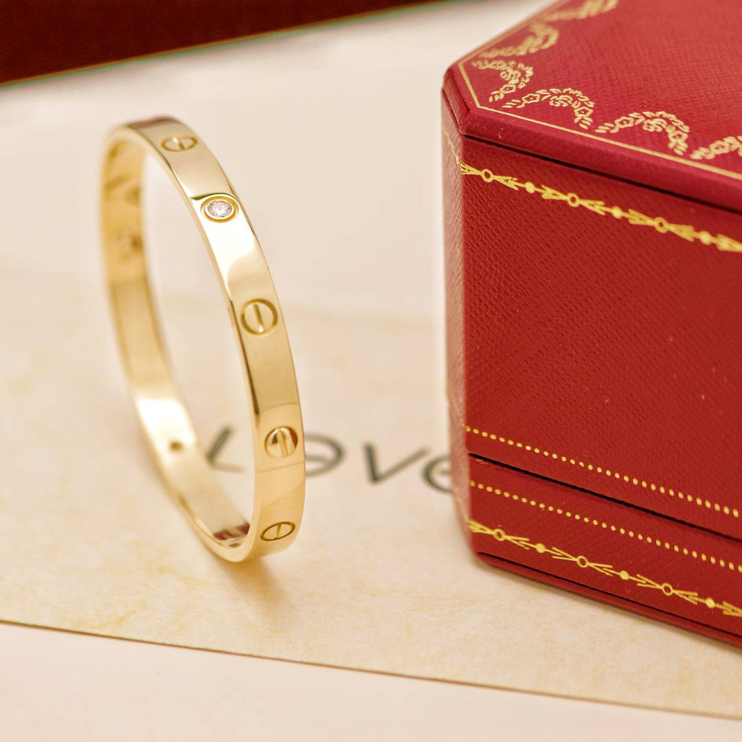 Preowned Cartier Love 4 Diamond 18K Yellow Gold Bracelet Size 18