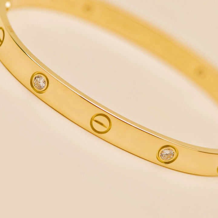 Preowned Cartier Love 4 Diamond 18K Yellow Gold Bracelet