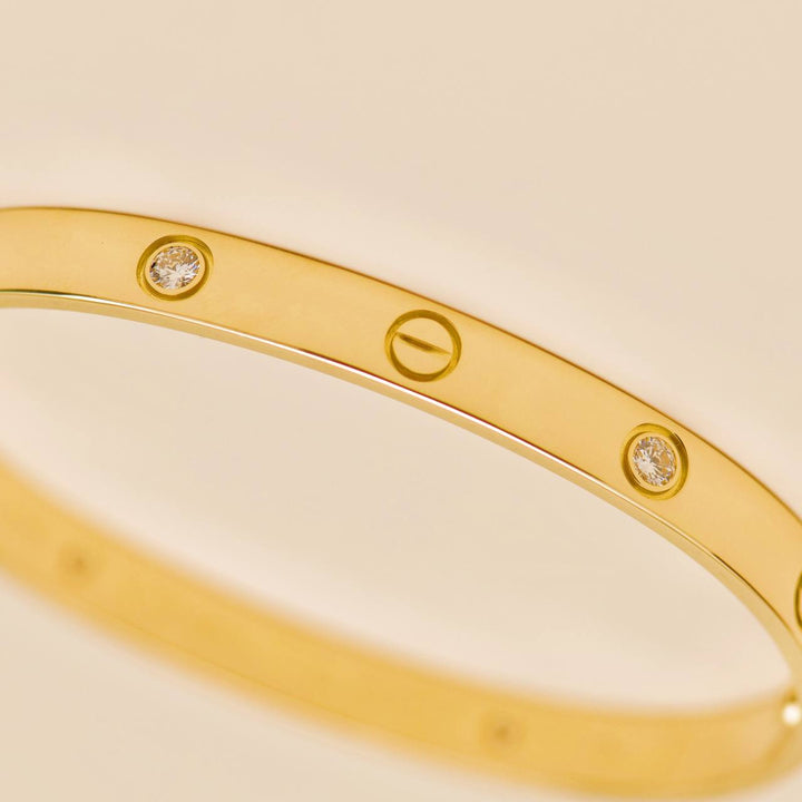 Second hand Cartier Love 4 Diamond 18K Yellow Gold Bracelet