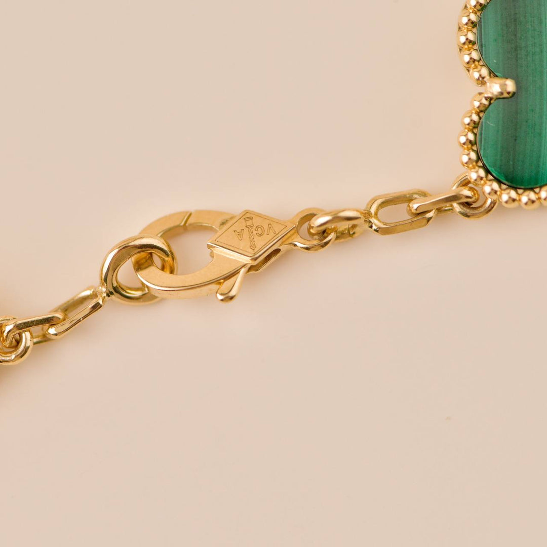 Second Hand Van Cleef Vintage Alhambra 5 Motif Malachite 18K Yellow Gold Bracelet