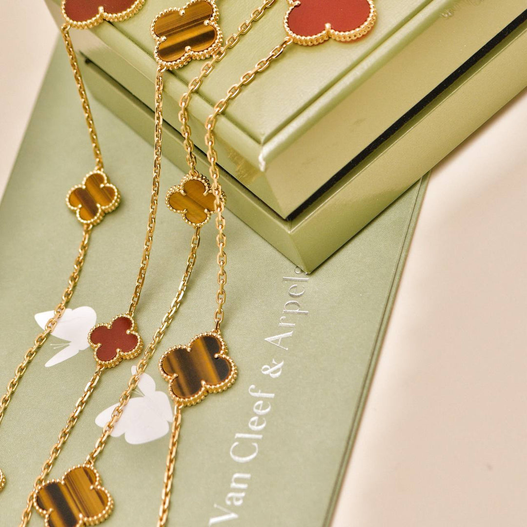 Used Van Cleef & Arpels Magic Alhambra 16 Motif Carnelian Tiger's Eye 18K Yellow Gold Necklace