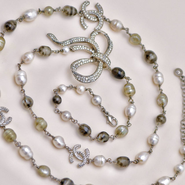 Used Chanel CC Collection Faux Pearl Crystal Bow Bead Necklace