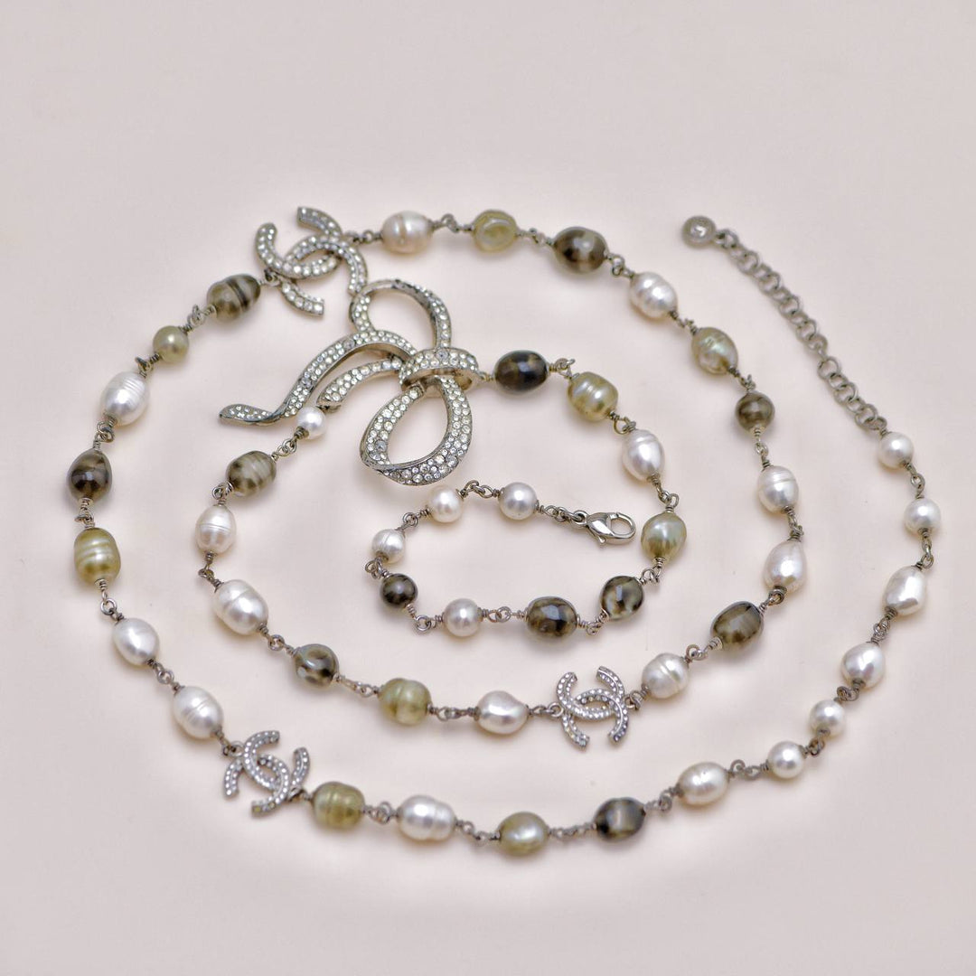 Second Hand Chanel CC Collection Faux Pearl Crystal Bow Bead Necklace