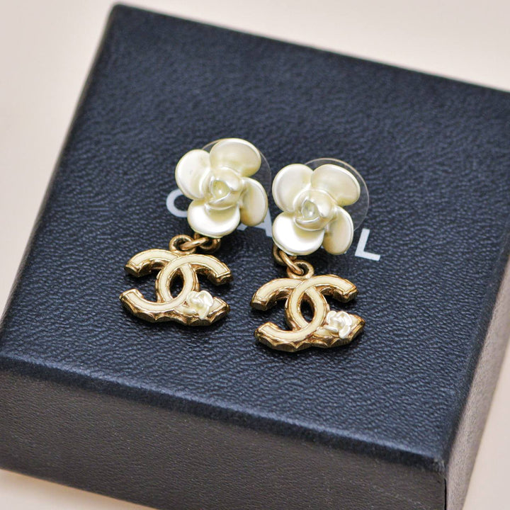 Preowned Chanel CC Collection White Gold Enamel Floral Dangle Earrings