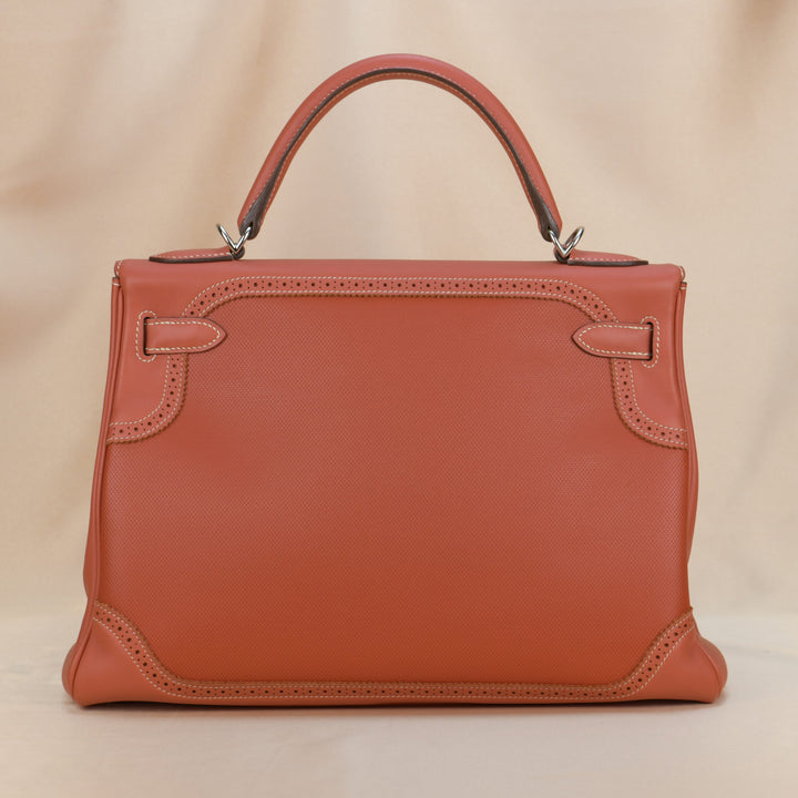 Second Hand Hermès Kelly 32 Ghillies Retourne Swift Leather Palladium Hardware Handbag