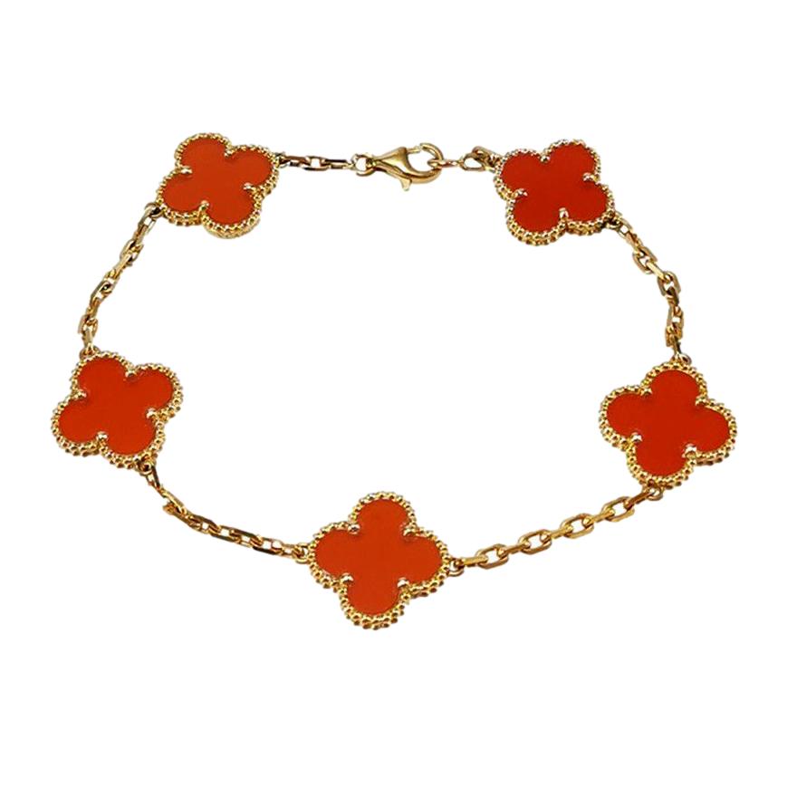 Van cleef best sale coral alhambra