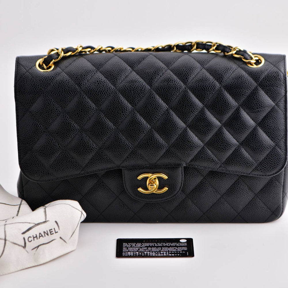 Preowned Chanel Jumbo Black Calfskin Caviar Double Flap Bag with GHW
