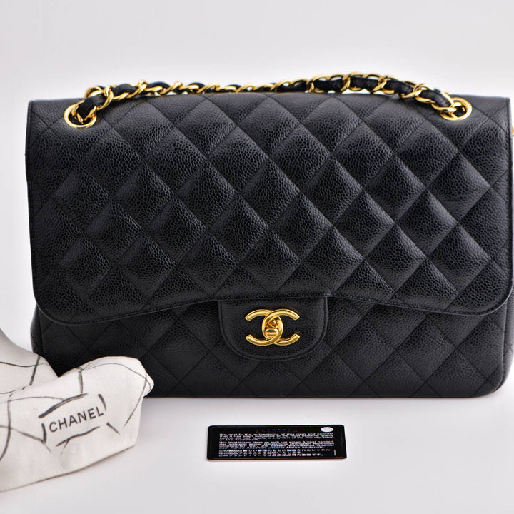 Preowned Chanel Jumbo Black Calfskin Caviar Double Flap Bag with GHW
