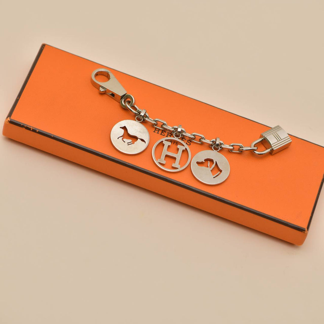 Preowned Authentic Hermès Breloque Olga Silver Bag Charm Amulette
