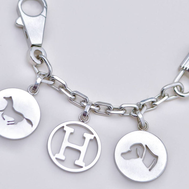Second Hand Hermès Breloque Olga Silver Bag Charm Amulette