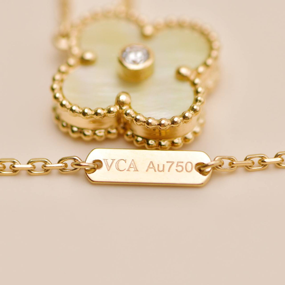 Preowned Authentic Van Cleef 2018 Holiday Pendant Golden Mother of Pearl Diamond 18K Yellow Gold