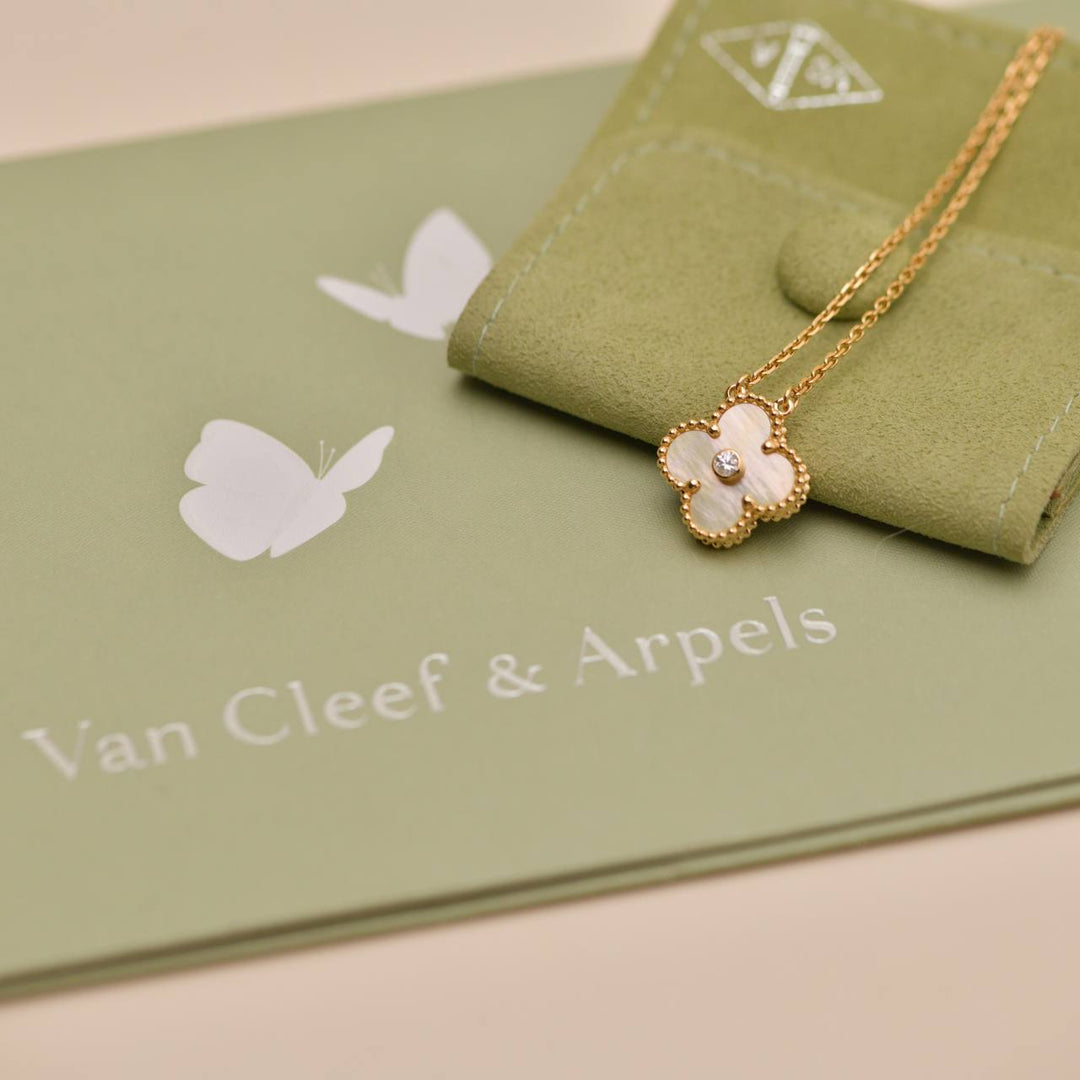 Preowned Authentic Van Cleef & Arpels 2018 Holiday Pendant Golden Mother of Pearl Diamond 18K Yellow Gold