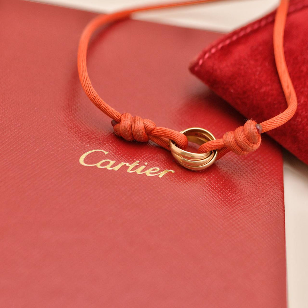 Preowned Authentic Cartier Trinity Cord Bracelet 18K Rose Gold