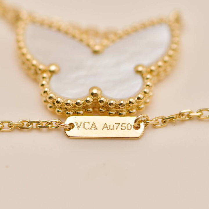 Second Hand Authentic Van Cleef & Arpels Lucky Alhambra Butterfly Necklace Mother of Pearl 18K Yellow Gold