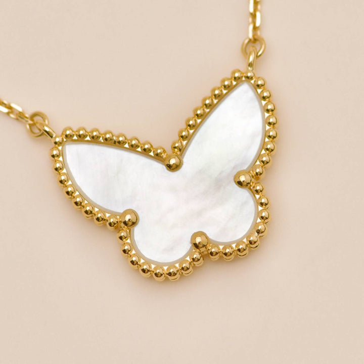 Preowned Authentic Van Cleef Lucky Alhambra Butterfly Necklace Mother of Pearl 18K Yellow Gold