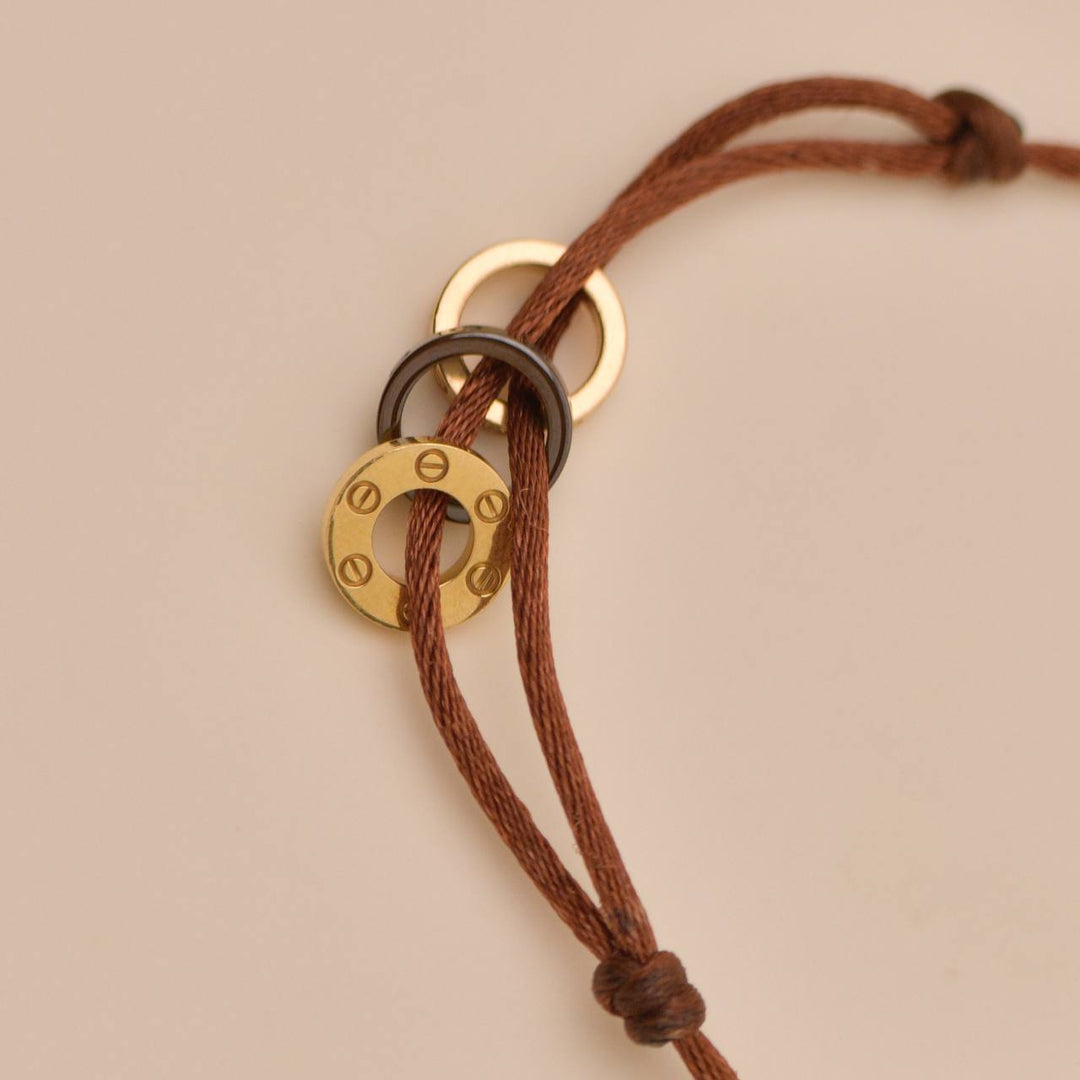 Preloved Cartier Love 4 Diamond Sèvres Porcelain Brown 18K Yellow & Rose Cord Bracelet