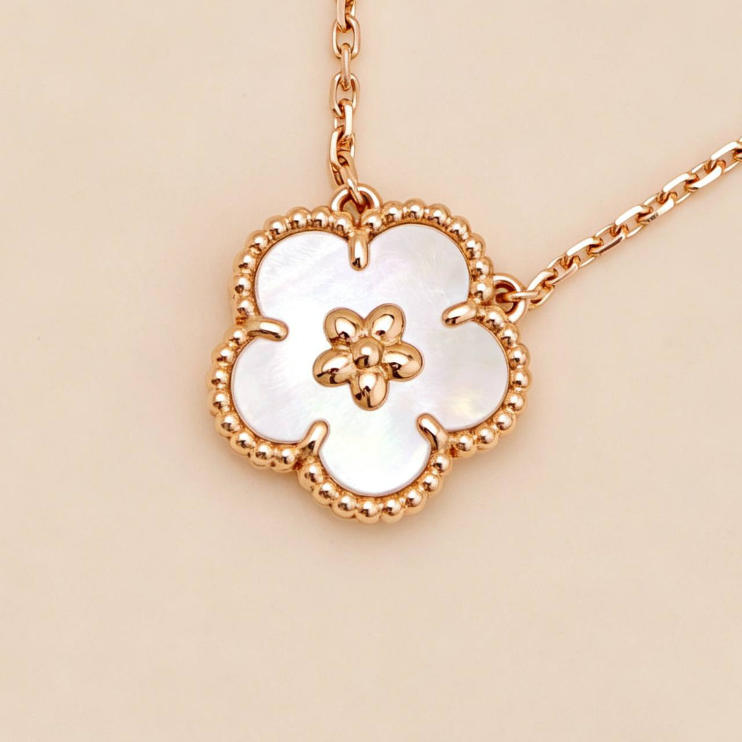 Preowned Authentic Van Cleef Lucky Spring Plum Blossom Pendant Mother of Pearl
