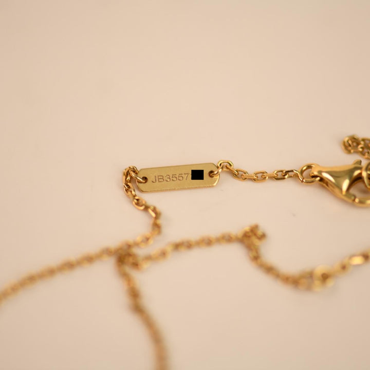 Preowned Authentic VCA Vintage Alhambra Carnelian Pendant 18K Yellow Gold
