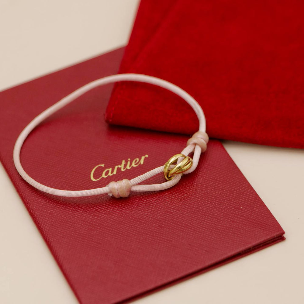 Preowned Authentic Cartier Trinity Cord Bracelet 18K Yellow Gold