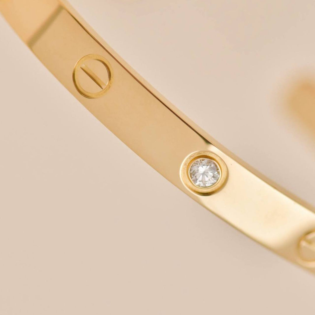 Authentic Second Hand Cartier Love Cuff Bracelet One Diamond 18K Yellow Gold 